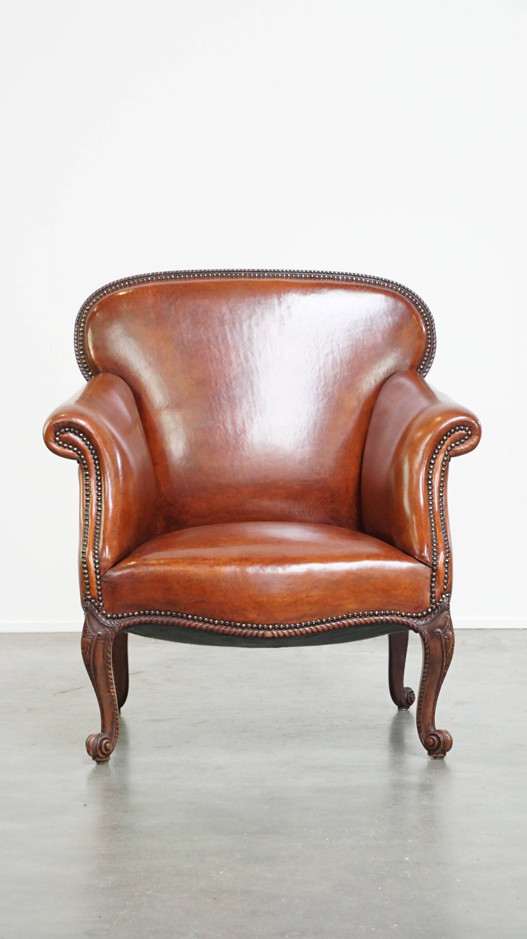 Fully restored antique sheepskin armchair