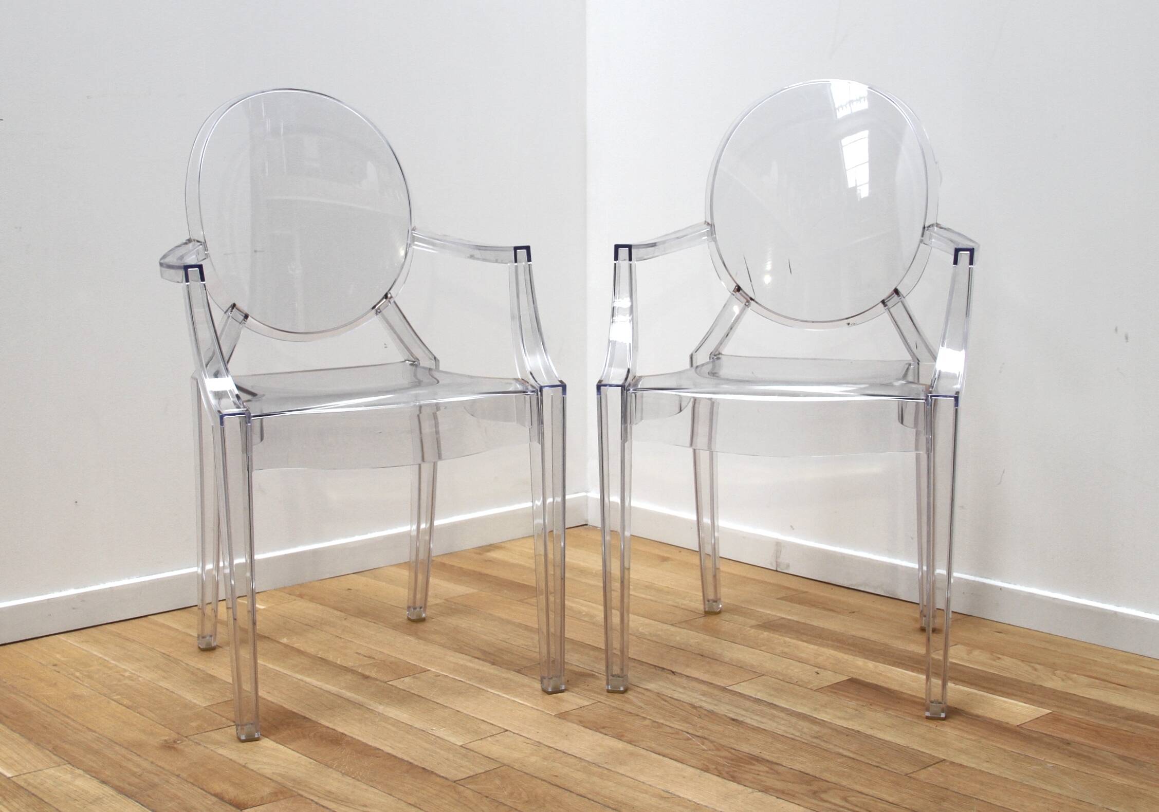Pair of Louis Ghost chairs, Philippe Starck