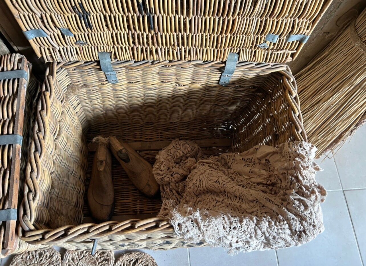Old wicker moving trunk