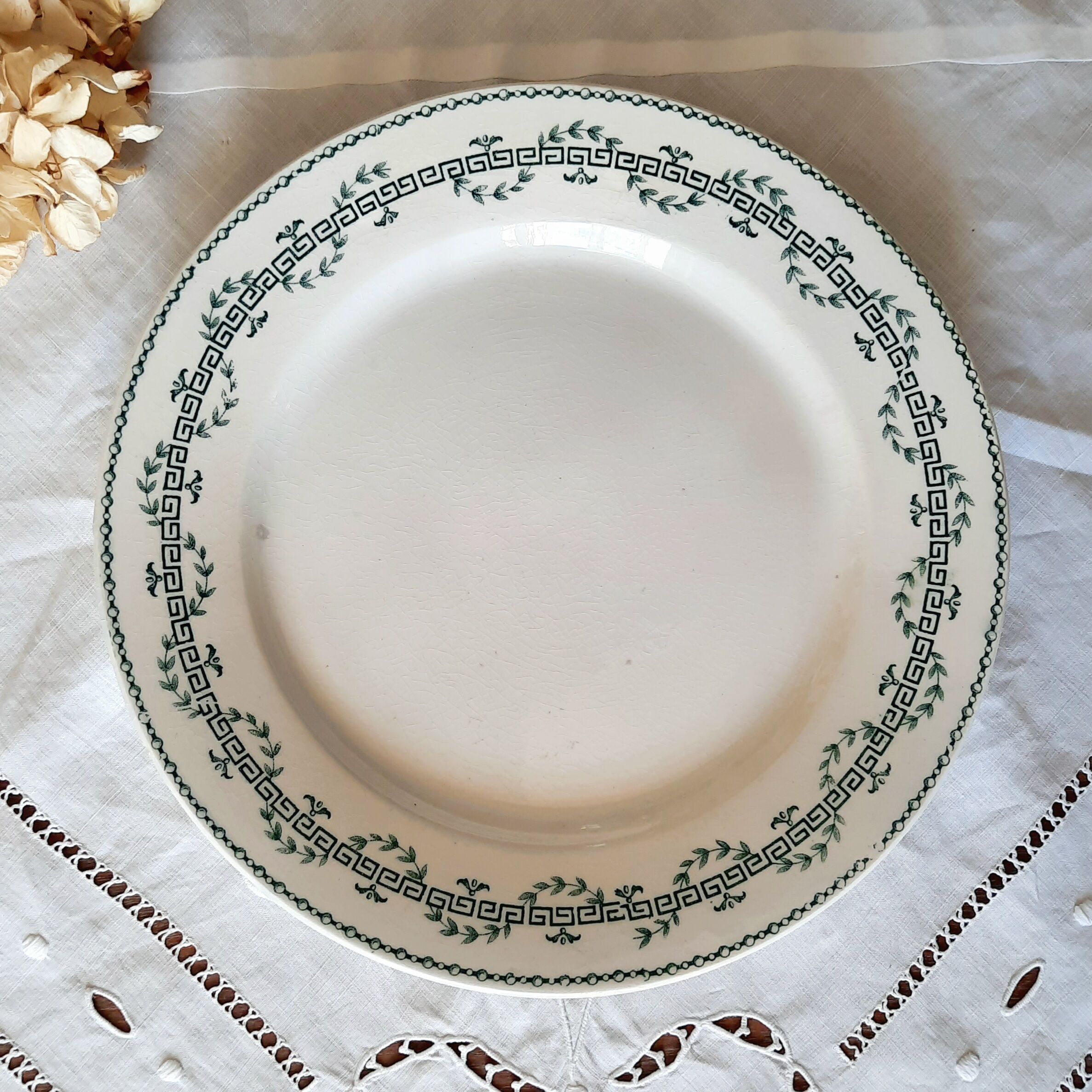 Old flat plates mismatched in earthenware