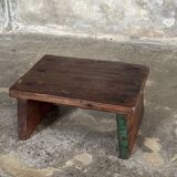 Small auxiliary stool in upcycled teak with traces of green chrome on the leg.