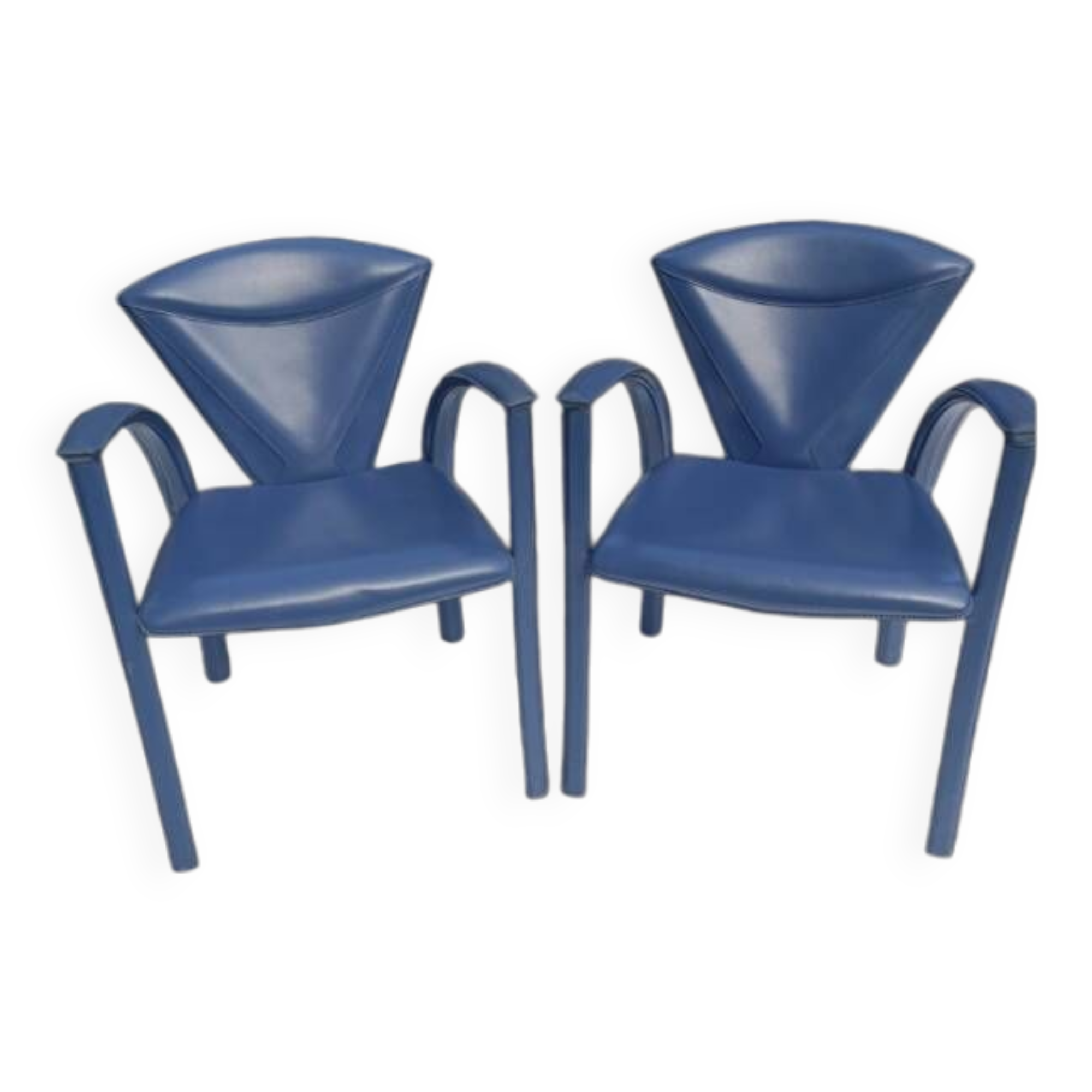 Armchairs covered in vintage blue leather