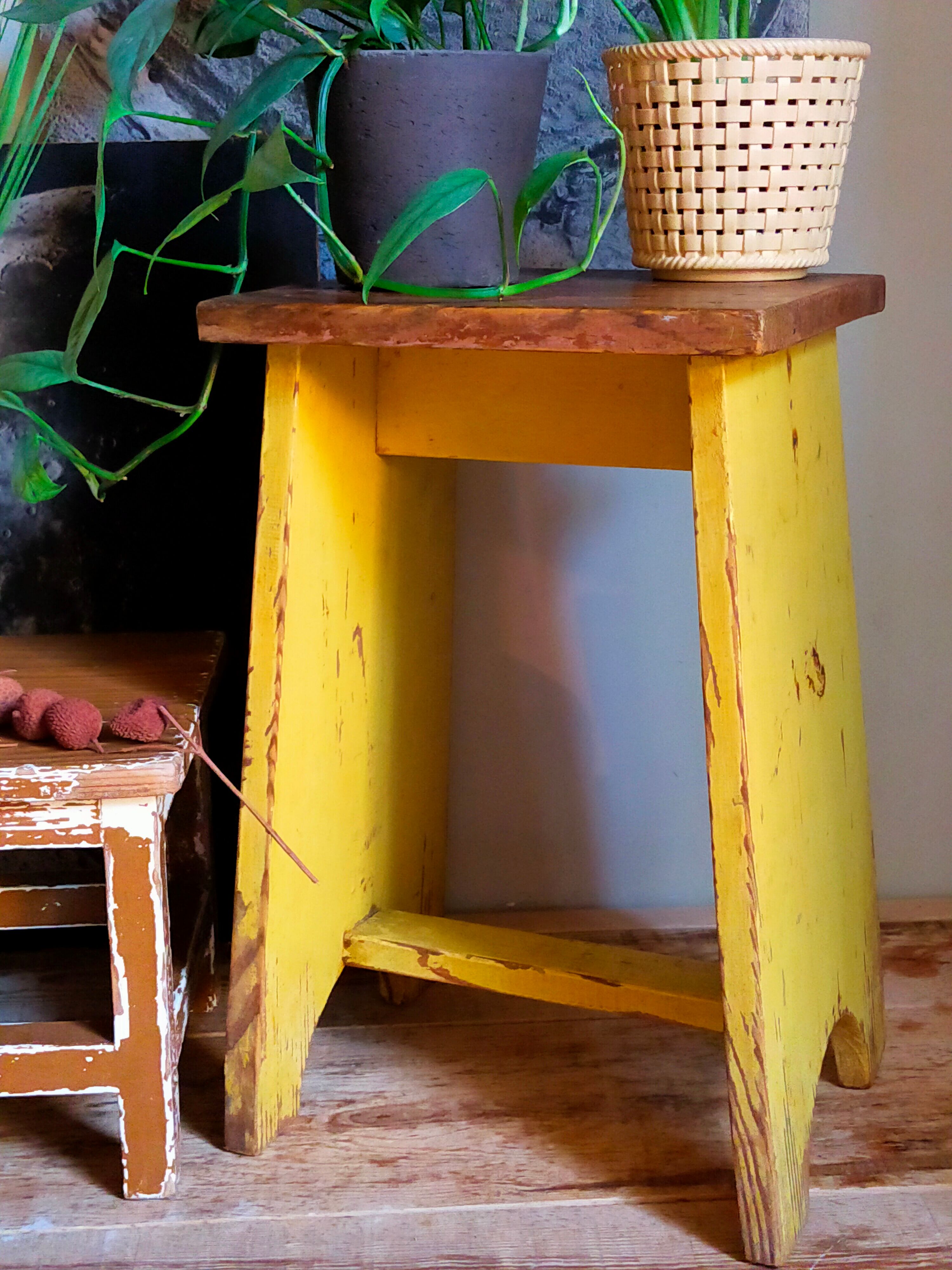 Art-populaire workshop stool in patinated wood