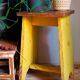 Art-populaire workshop stool in patinated wood
