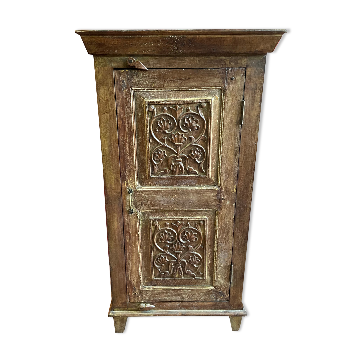 India. Bonnetière with a teak door finely carved by hand.