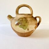 Small Provençal goat jug in creamy white and green enamelled stoneware