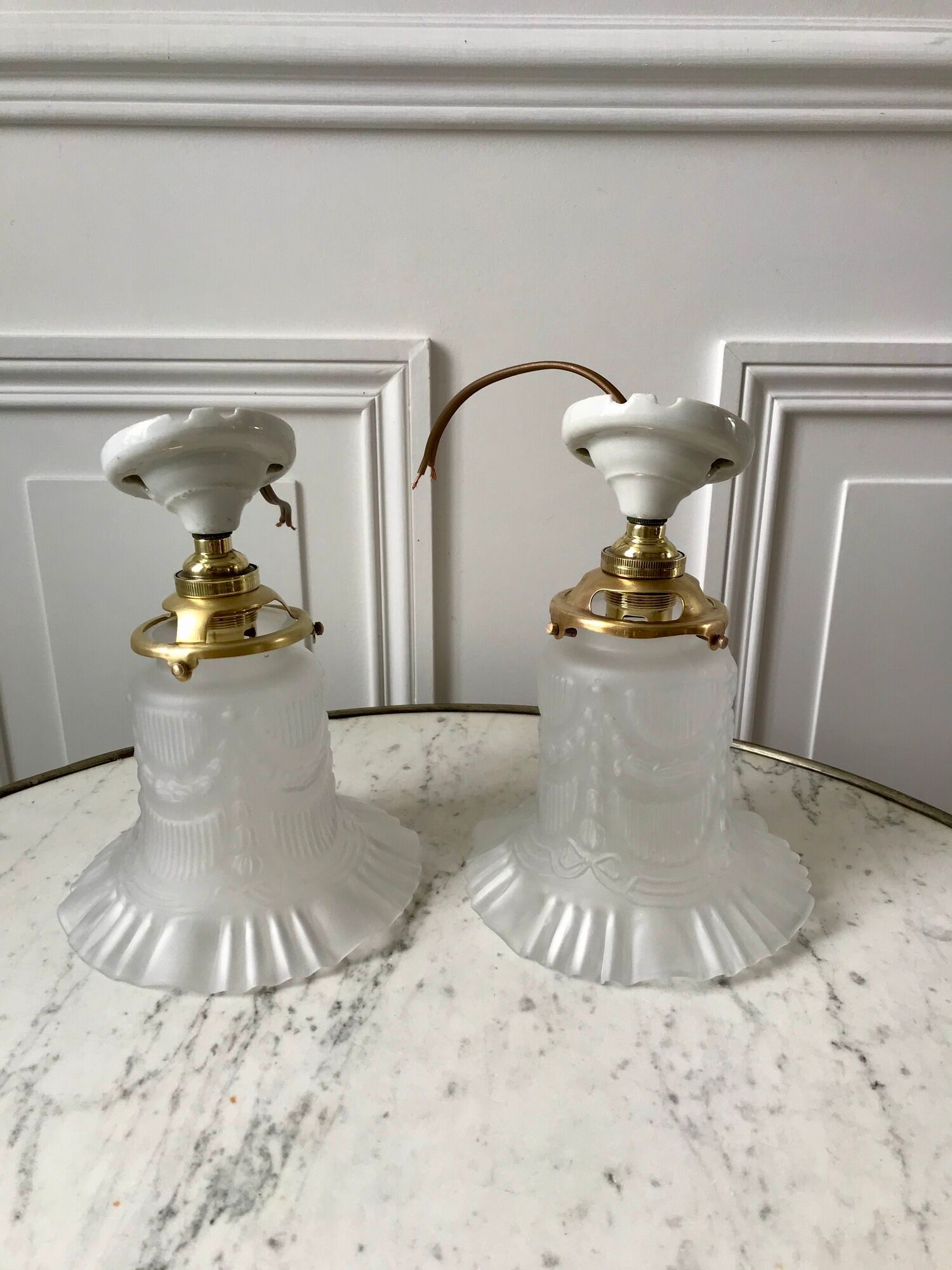 Pair of tulip wall lamps in molded glass on porcelain support 20s