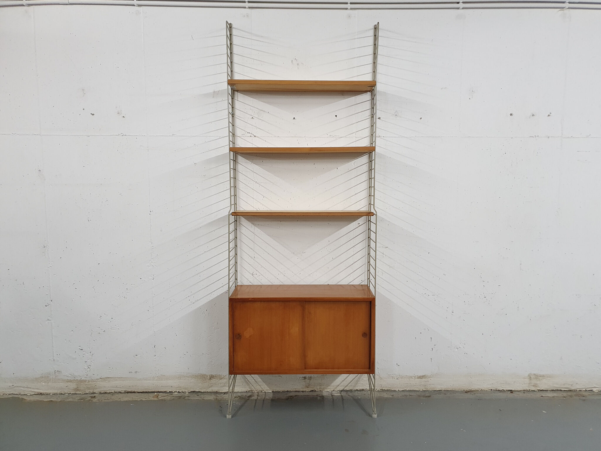 Pinewood wall unit by Nils “Nisse” Strinning for String, Sweden 1950's