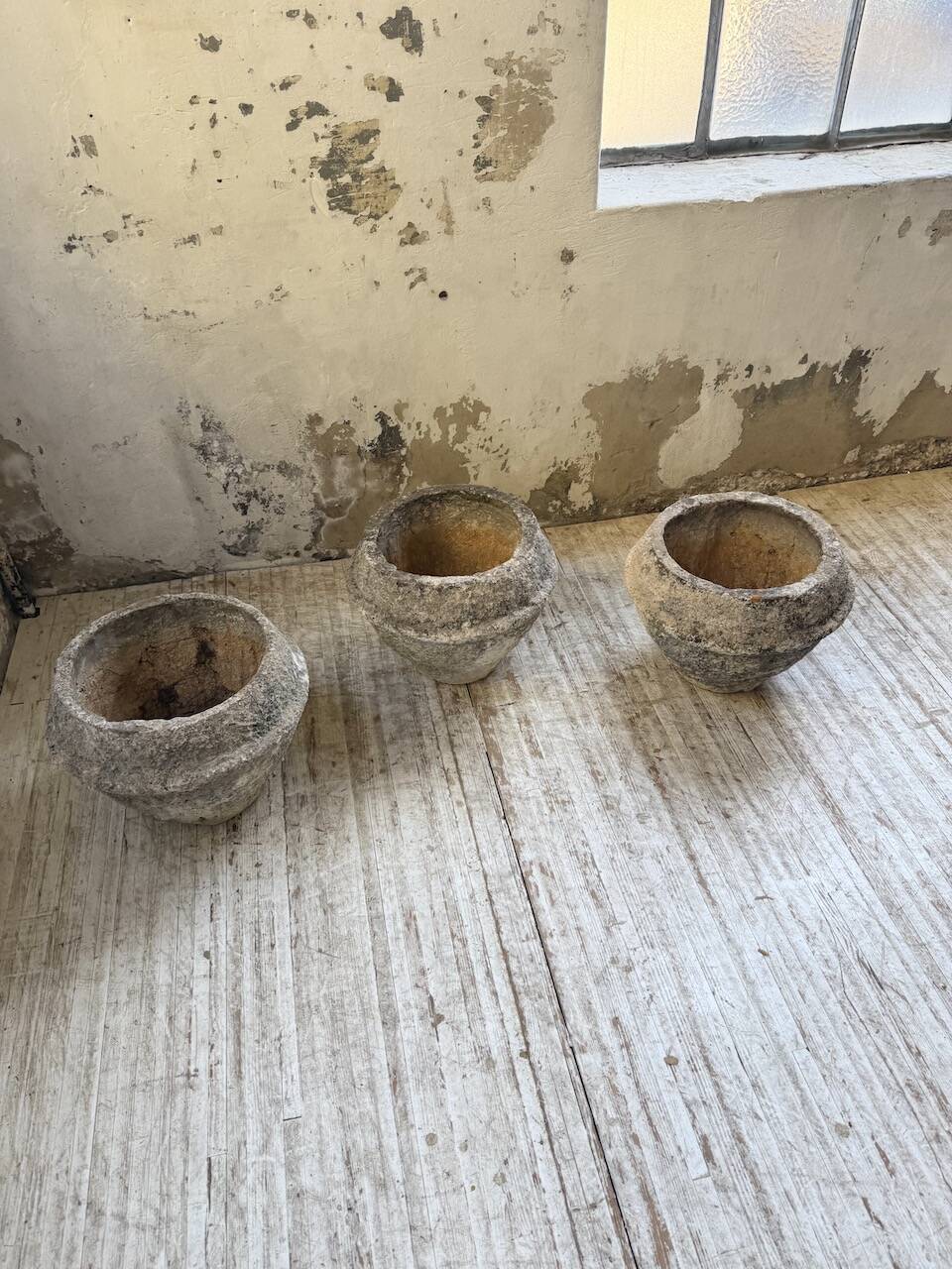 Trio of stone and cement planters, early 1900s