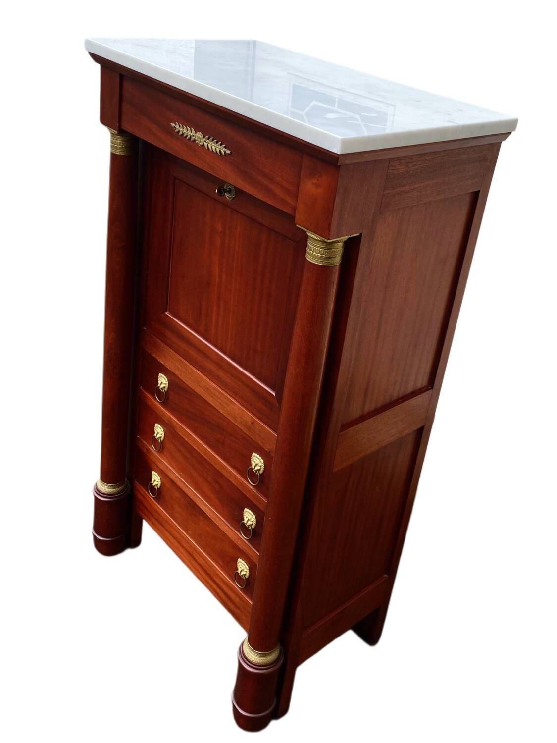 Empire secretary with white marble top in mahogany and brass, 6 drawers.