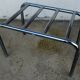 Hotel luggage rack, in chrome steel. The 50's