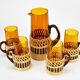Vintage orangeade glass and rattan set