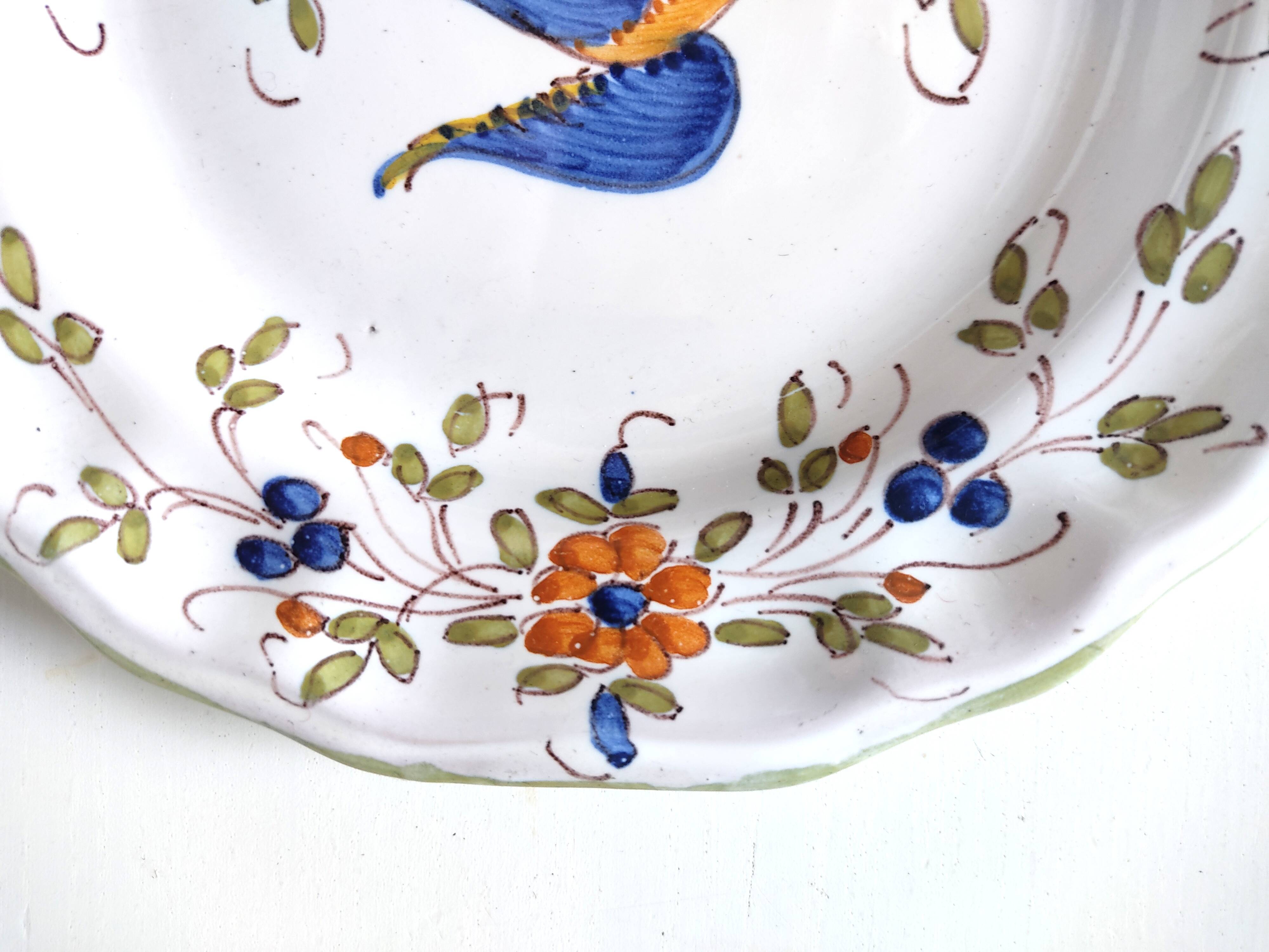 Moustiers earthenware decorative plate with bird