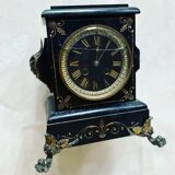 Black marble clock and brass ornament