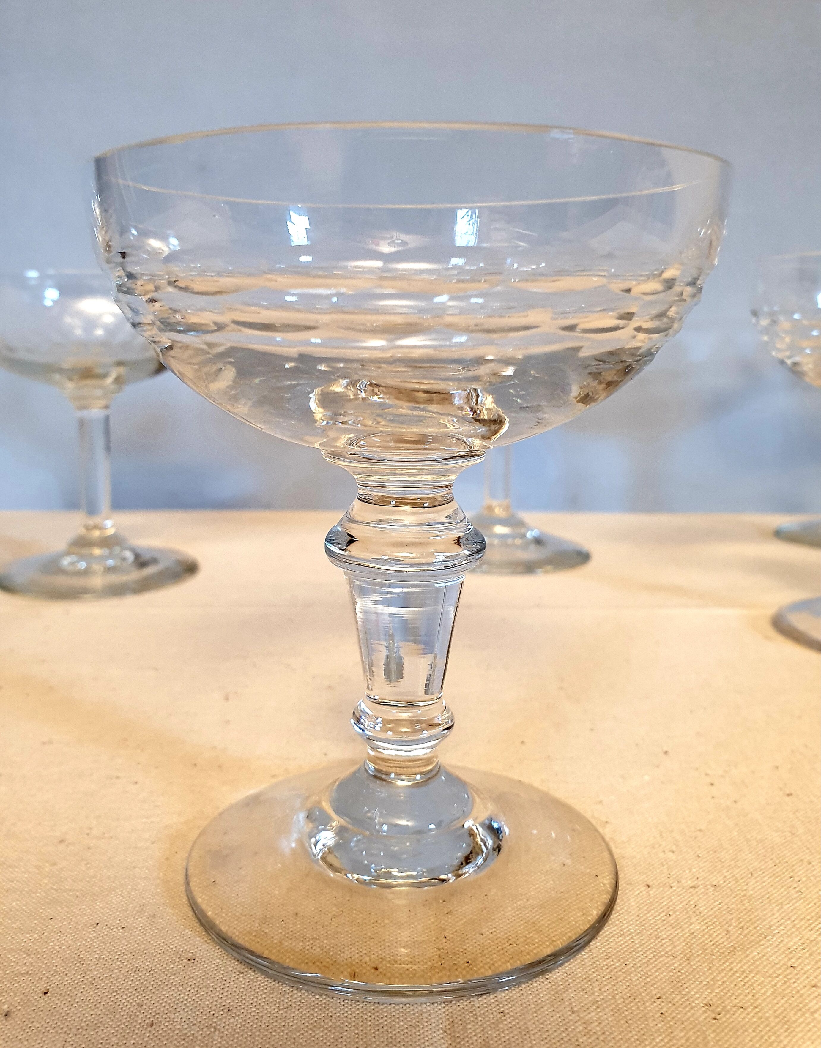 Assorted 7 engraved crystal Champagne cups.