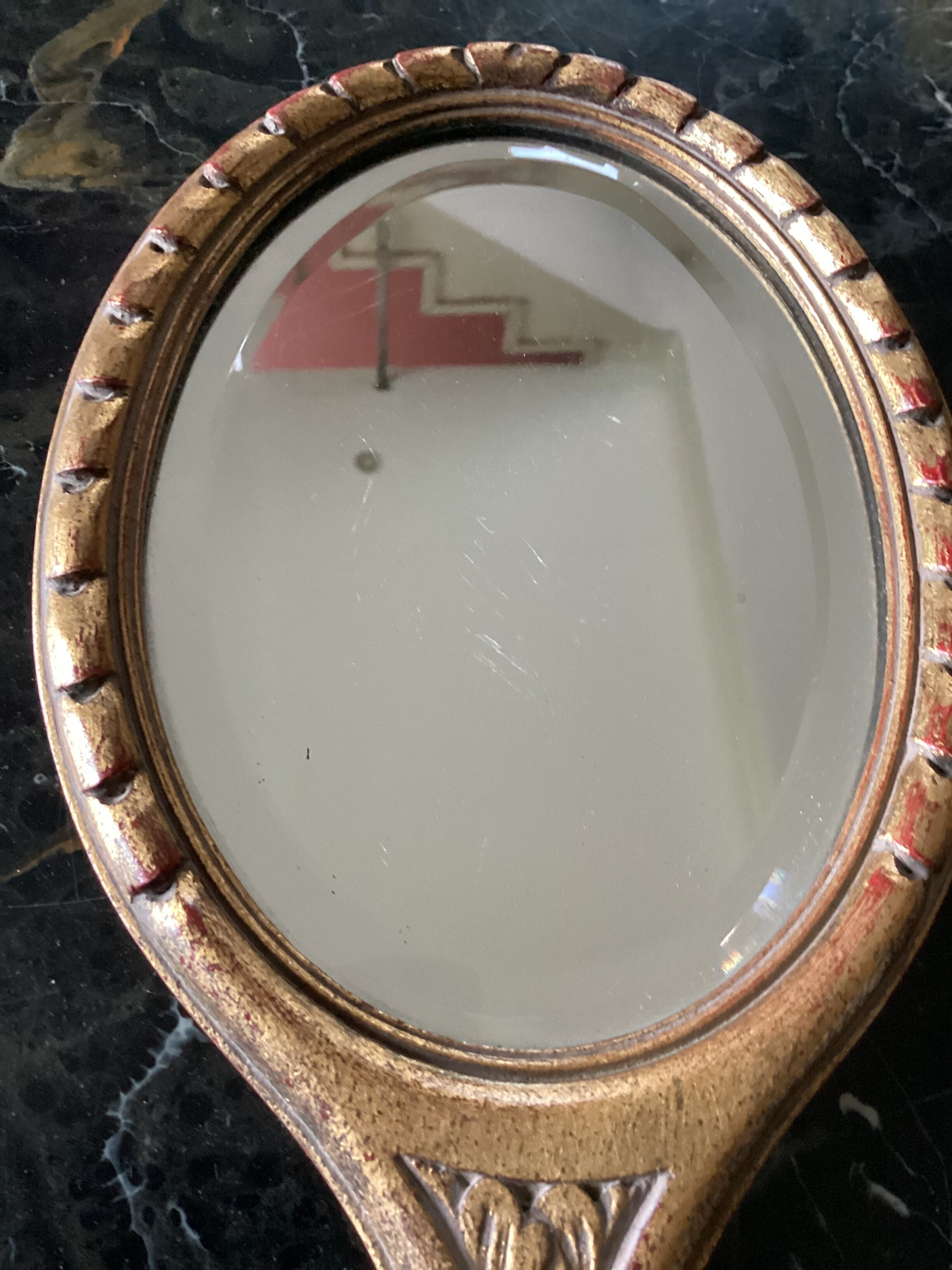 Hand-facing beveled mirror surrounded by wood dimension: height -38cm- width -15.5cm-