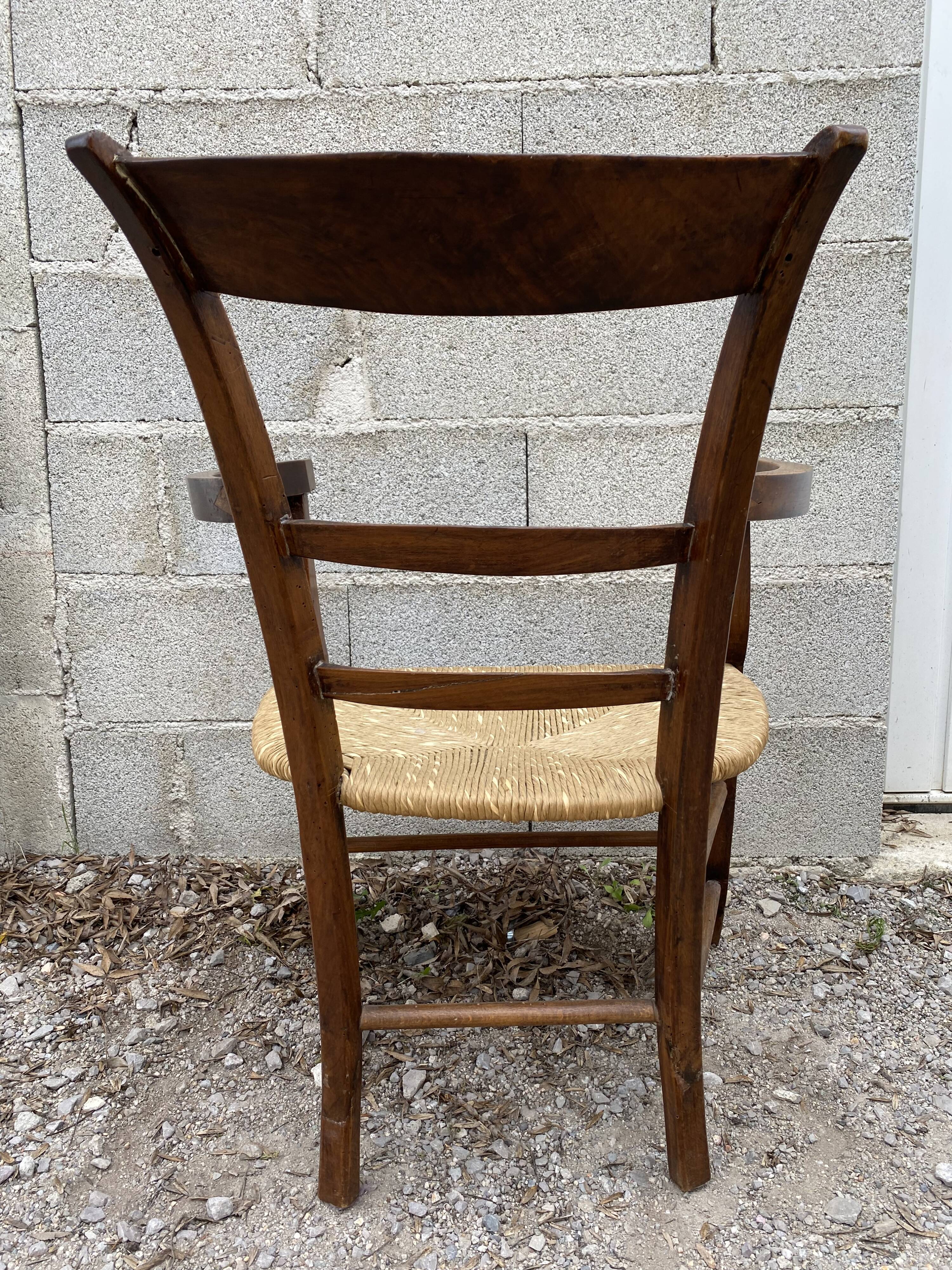 Antique straw armchair
