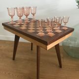 Side table with checkerboard pattern circa 1950