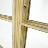 Vintage wooden window converted to a mirror