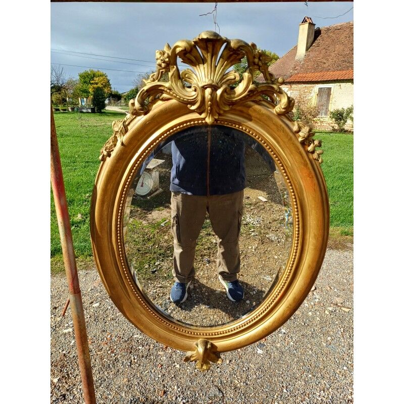 Miroir ovale en bois et stuc doré 19ème