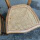Two Louis Philippe cane chairs in solid carved wood from the 20th century