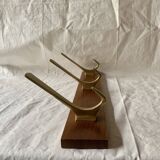 Vintage wooden wall-mounted coat rack with 3 golden cast aluminum hooks