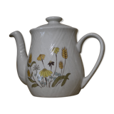 Teapot with yellow flowers