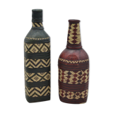 Set of 2 decorative vintage bottles covered with leather & wicker