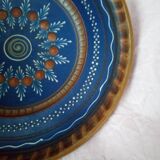 Plate in painted sandstone
