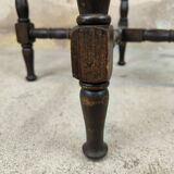 Vintage gueridon with beaded wooden legs.