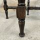 Vintage gueridon with beaded wooden legs.