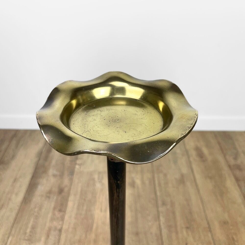 Brass ashtray on metal stand and wooden base