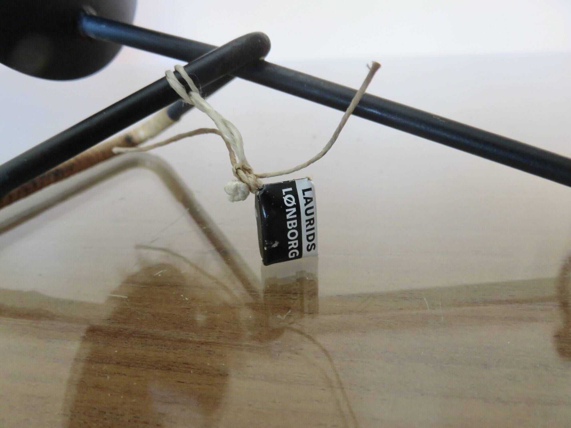 Authentic wall candle holder signed Laurids Lonborg, Denmark, metal and rattan.