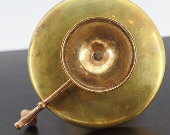 Brass hand candle holder