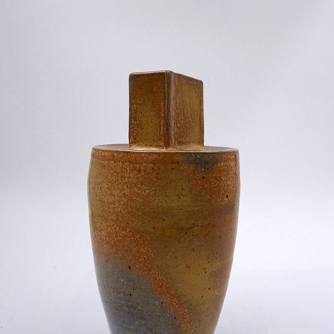 Vintage brown ceramic vase stamped "PV"