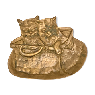 Empty brass pocket cats in an Old basket