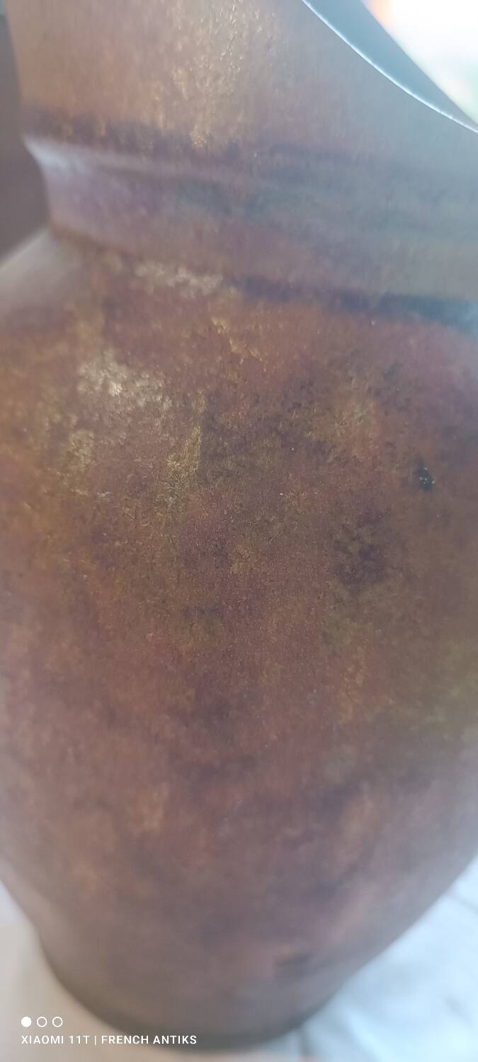 Jug, iridescent glazed stoneware carafe.