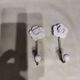 Pair of porcelain hooks