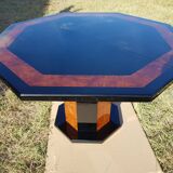 Octagonal table paul michel and its black lacquered chairs and elm magnifying glass