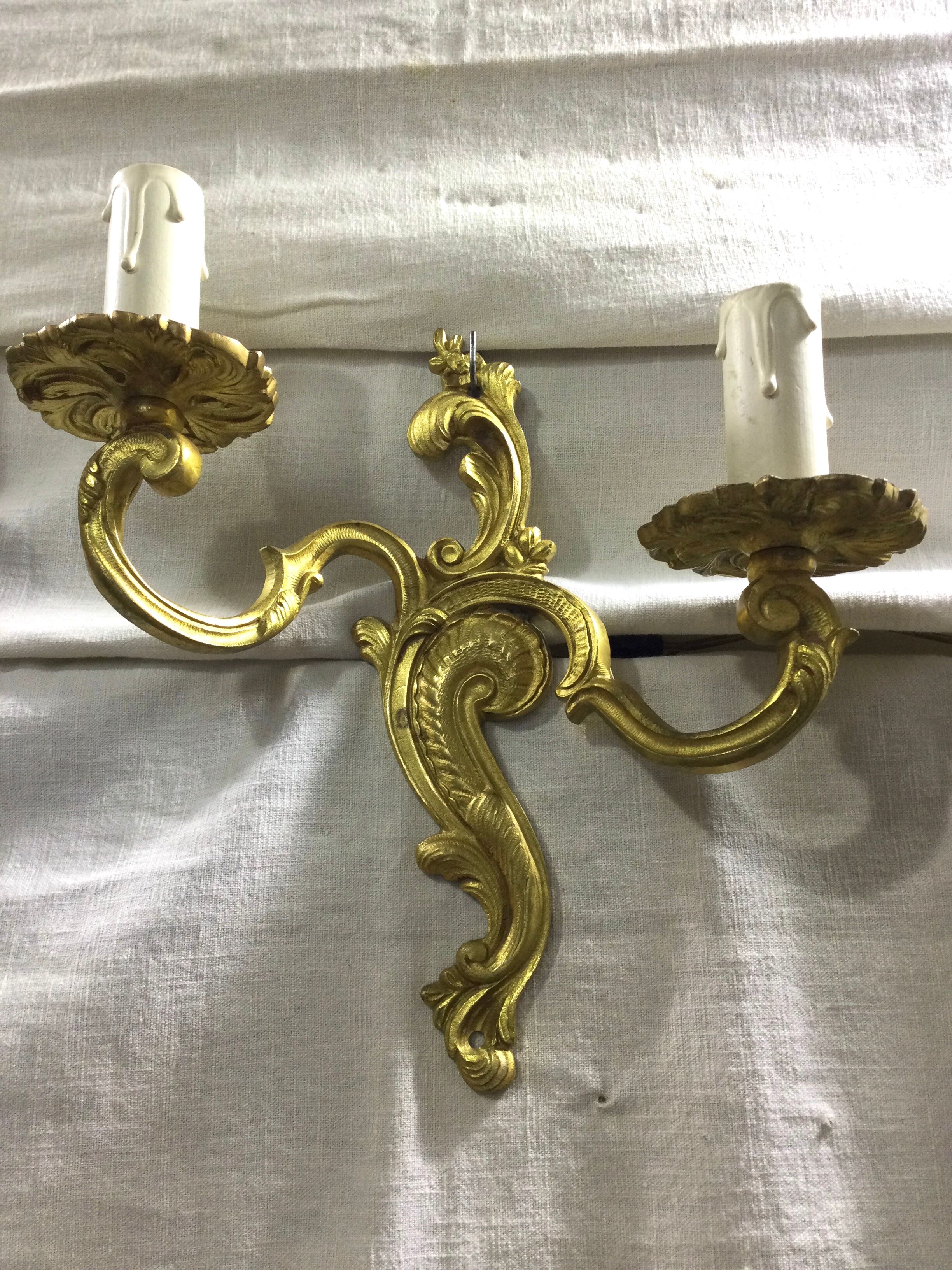 Pair of Louis XV style bronze sconces