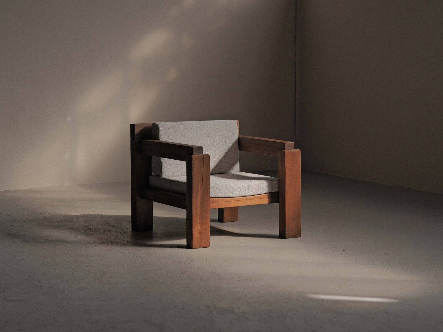 Handcrafted armchair in solid wood and fabric, 1980s-90s.