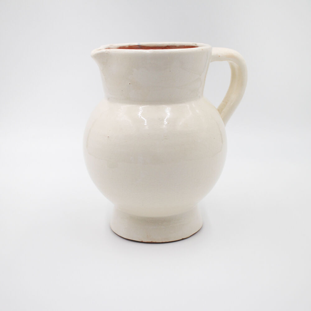 White pitcher in glazed stoneware