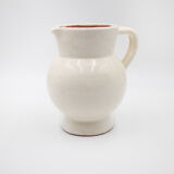 White pitcher in glazed stoneware
