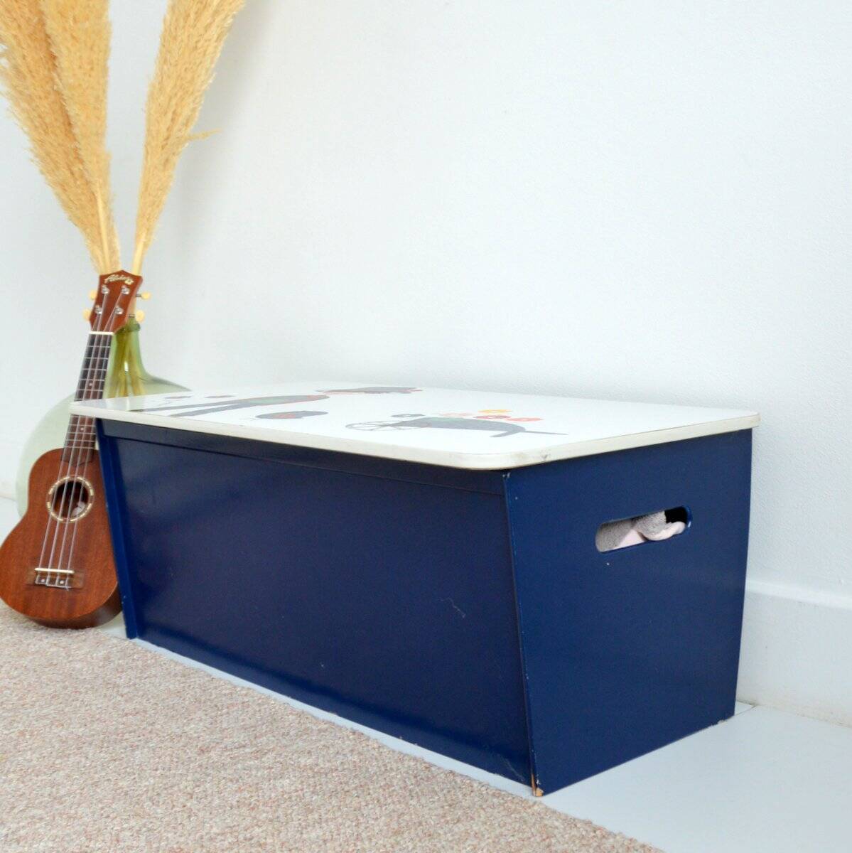 Beautiful wooden toy chest from the 1960s. Nature/gardening decor.