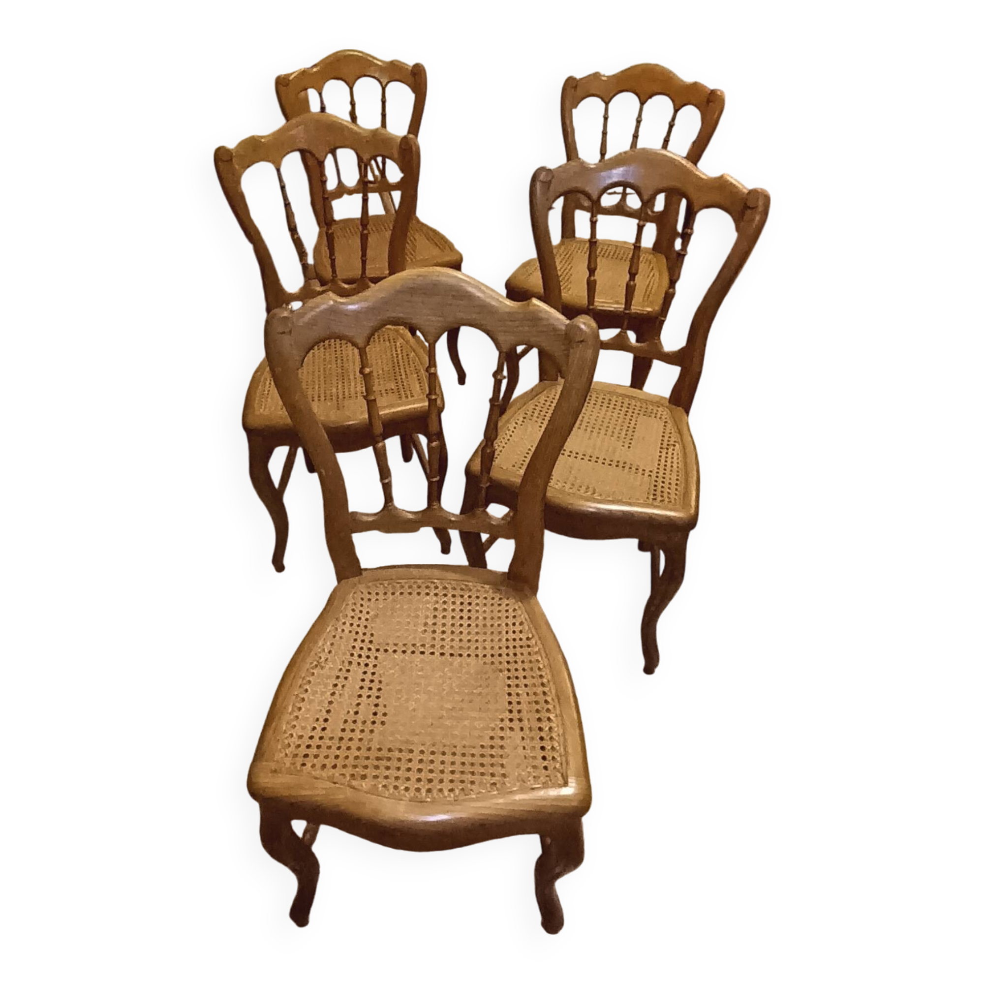 5 old caned chairs
