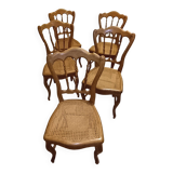 5 old caned chairs