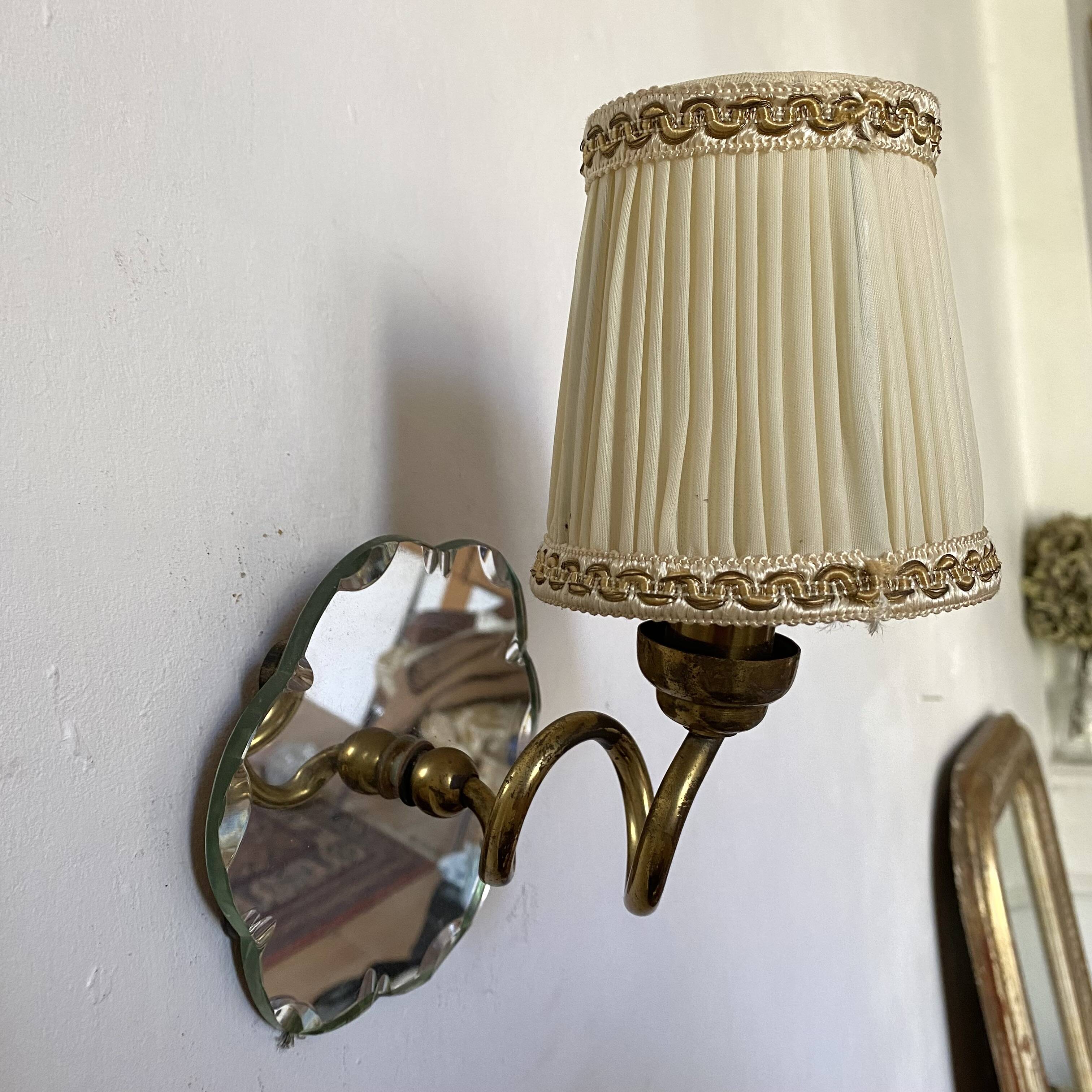 Pair of mirror and brass wall lights from the 50s and 60s