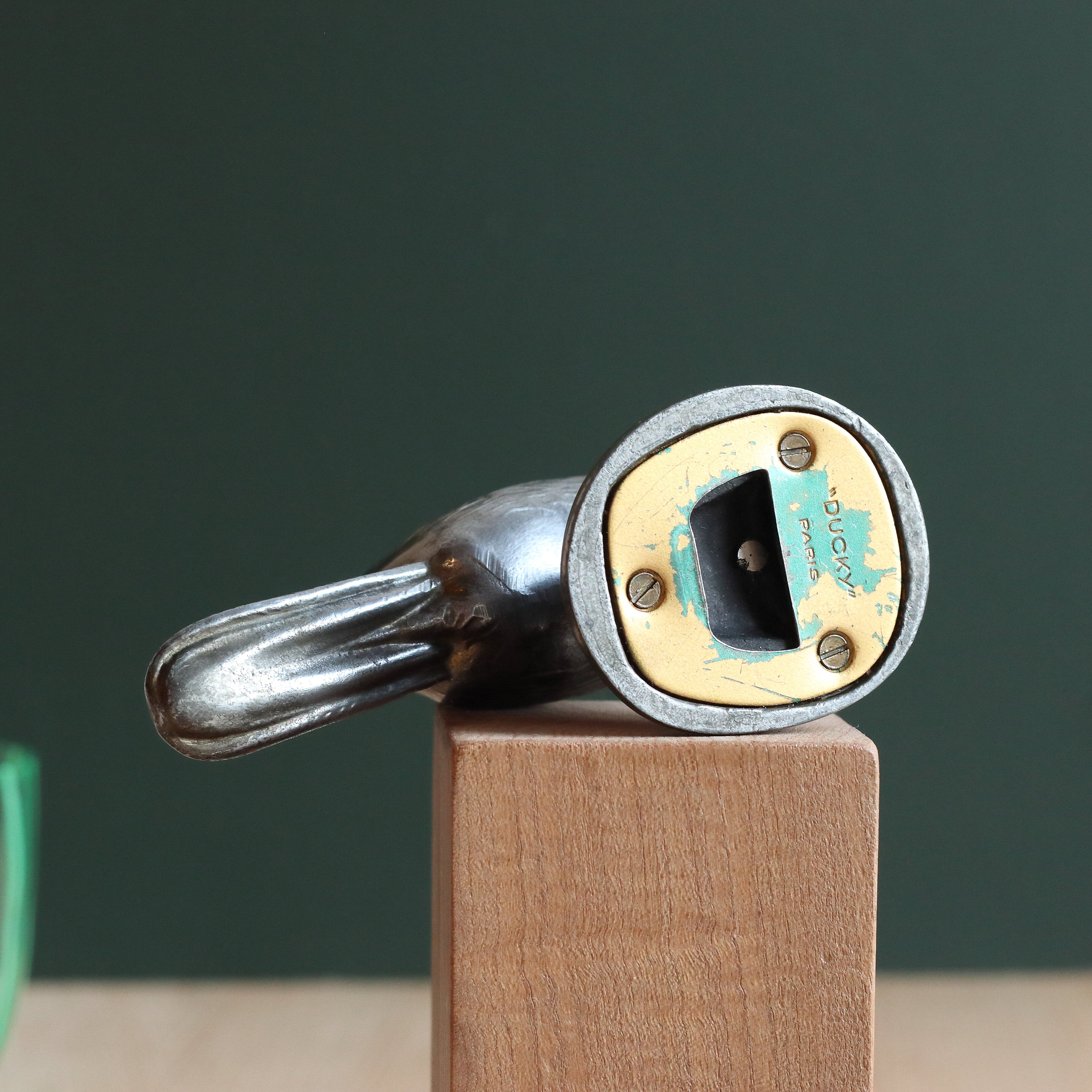 Vintage duck bottle opener signed Ducky in silver metal