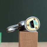 Vintage duck bottle opener signed Ducky in silver metal