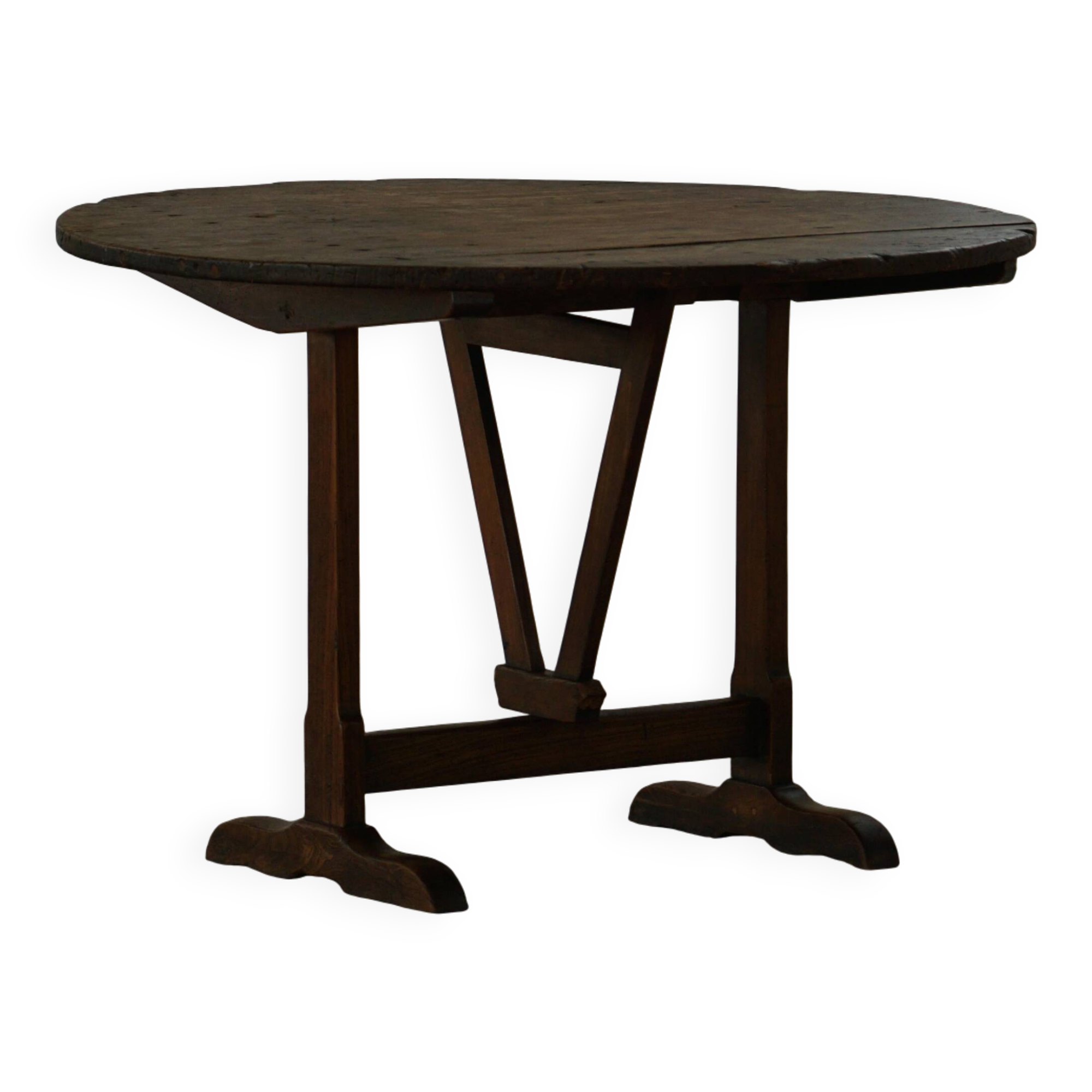 Round table with a tilting top from a 19th-century provincial French winemaker in oak.